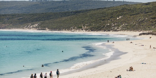 Beach walkers at Leeuwin-Naturaliste National Park. Photo by Tourism WA