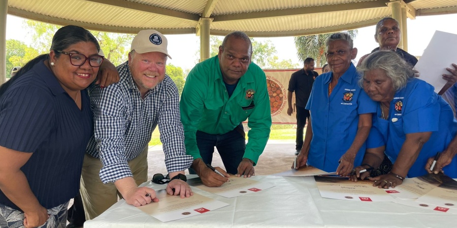 Minister for the Environment Matthew Swinbourn singing ILUA alongside Member for Kimberley Divina D'Anna and Miriuwung Gajerrong Corporation Minister for the Environment Matthew Swinbourn singing ILUA alongside Member for Kimberley Divina D'Anna and Miriuwung Gajerrong Corporation