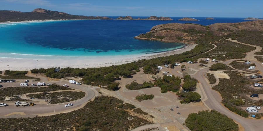 A campground with blue ocean in the background
