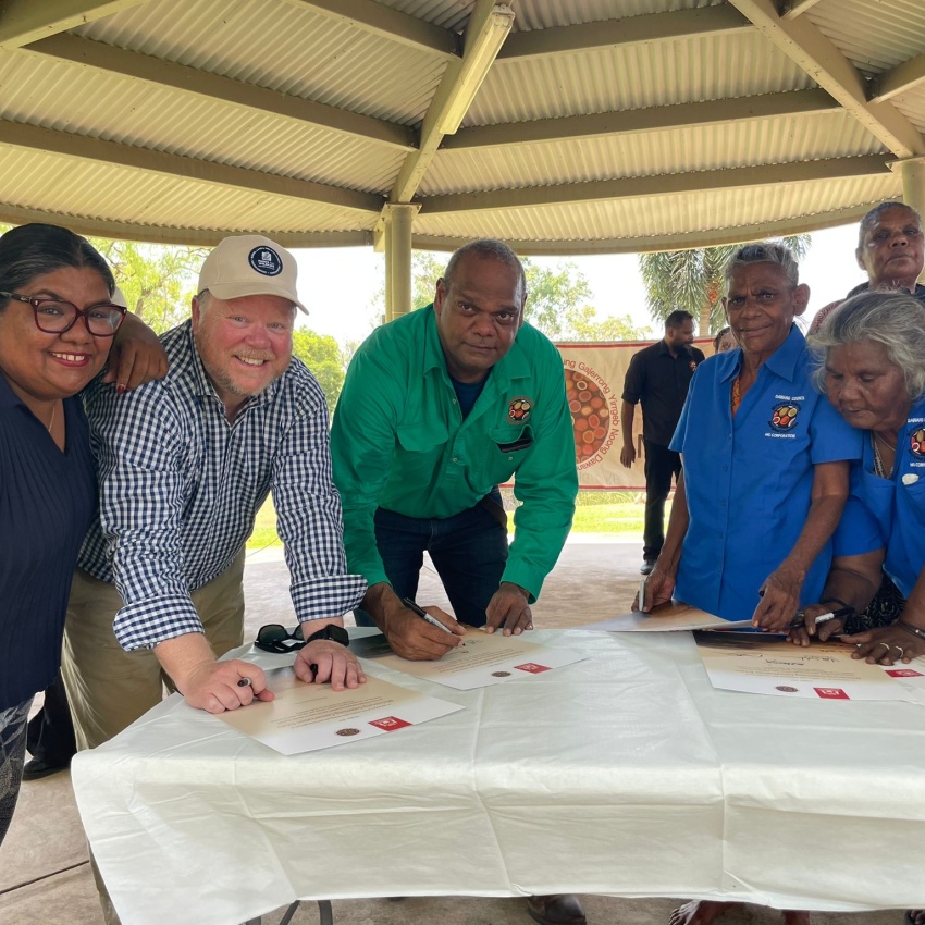 Minister for the Environment Matthew Swinbourn singing ILUA alongside Member for Kimberley Divina D'Anna and Miriuwung Gajerrong Corporation