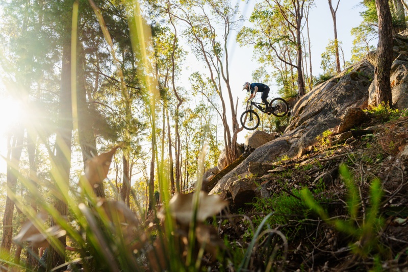 Mountain bike rider coming down steep slope. Photo Josh Cowling/Shire of Murray Mountain bike rider coming down steep slope. Photo Josh Cowling/Shire of Murray