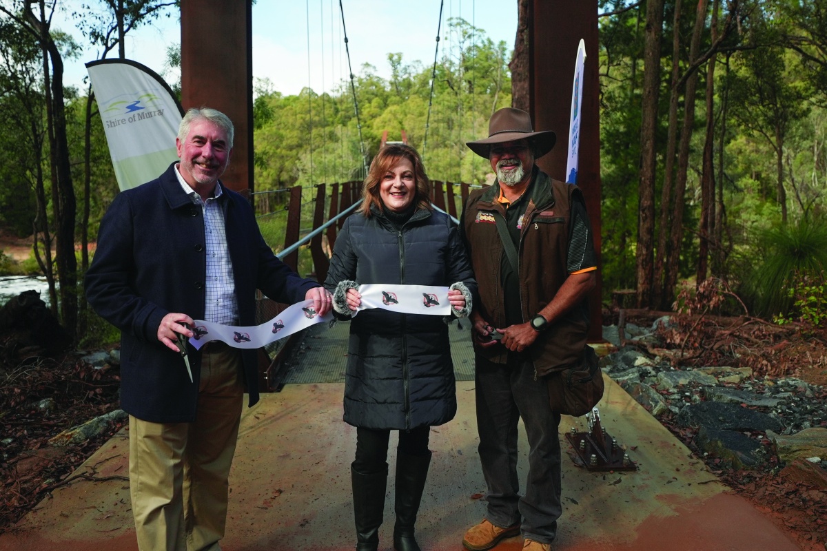 Cr David Bolt, Shire of Murray President; Robin Clarke MLA, Member for Murray Wellington; and Maitland Hill, Traditional Owner, officially open the Dwaarlindjirraap bridge. Photo - Shem Bisluk/DBCA