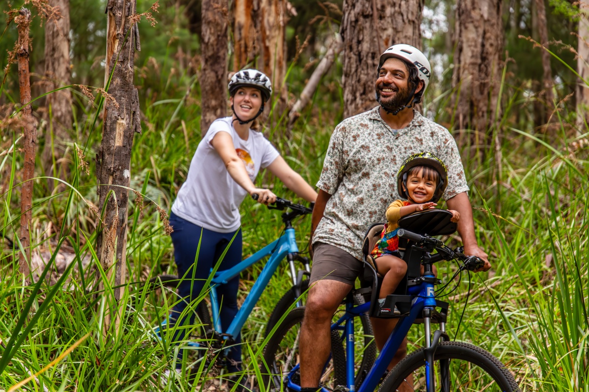 The Giants Trails are family friendly. Photo Nic Quinn/Ride On Happy family riding on the trail
